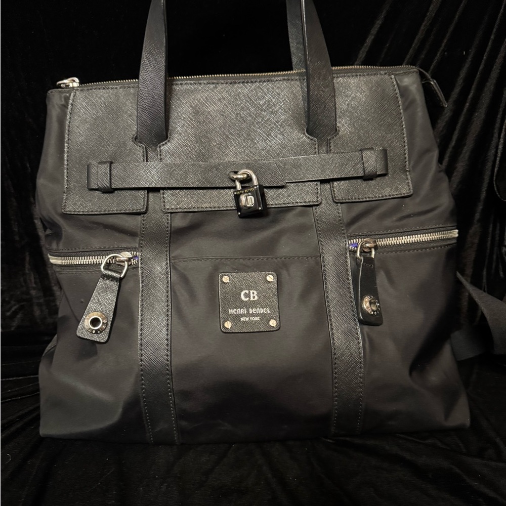 Henri Bendel jetsetter Black backpack purse includes dust cover